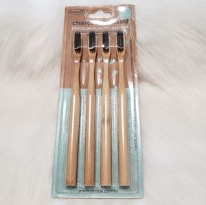 Charcoal infused bamboo toothbrush set.